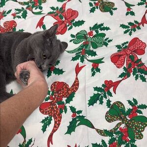 Vintage Christmas tablecloth green red ribbons